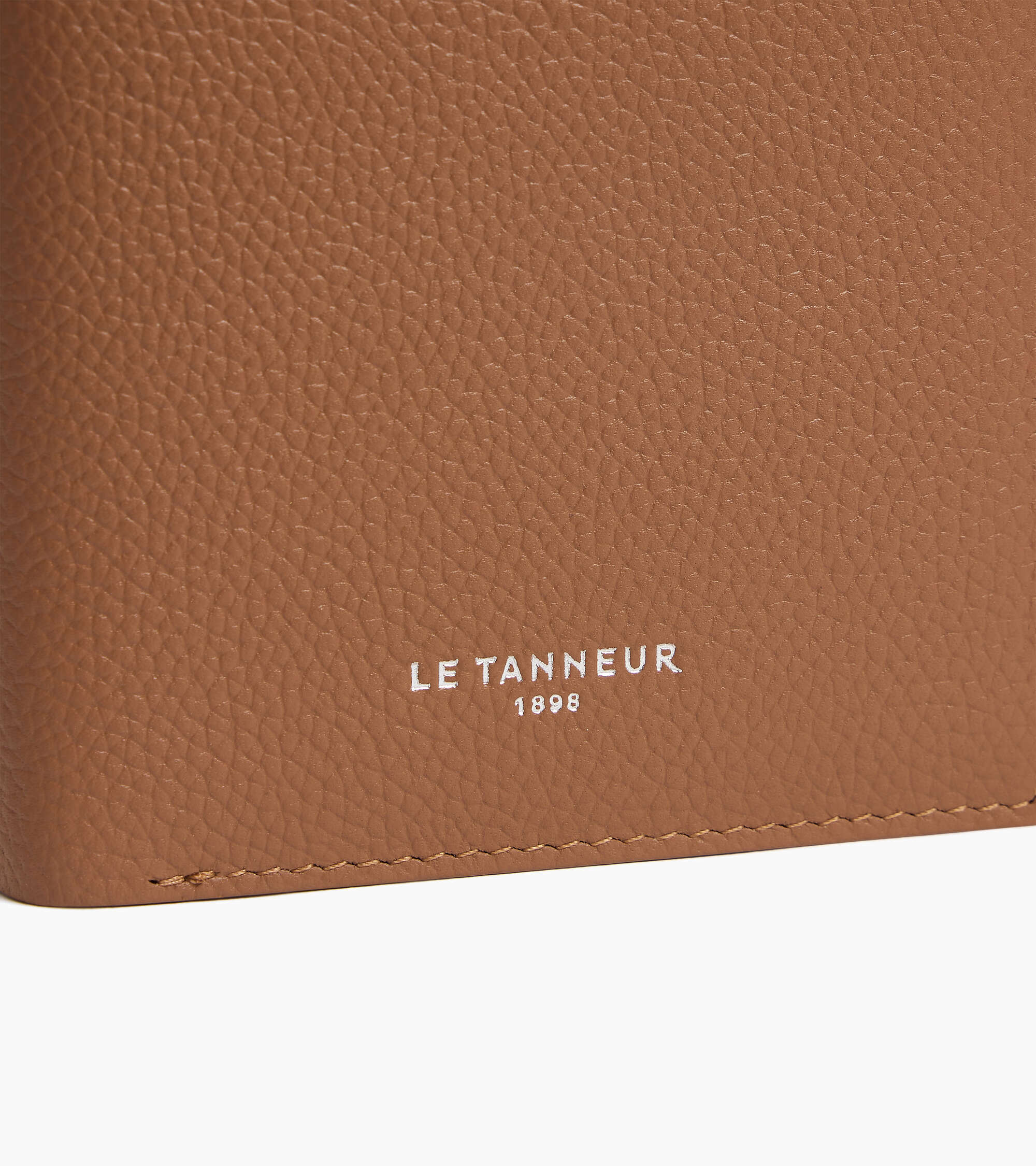 Lucien medium vertical zipped wallet in grained leather